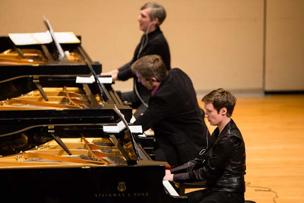 three of the pianists in the grand band