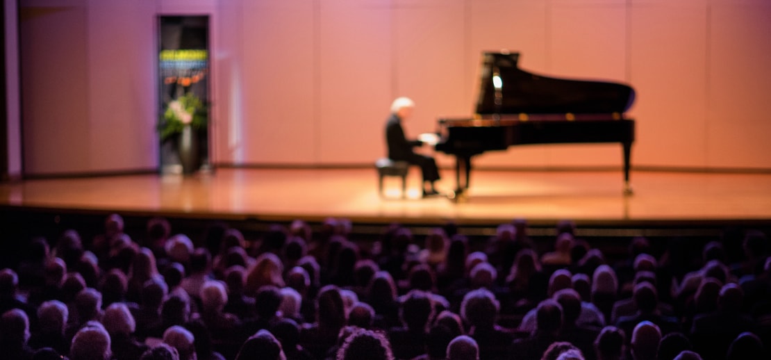 gentleman playing piano on stage