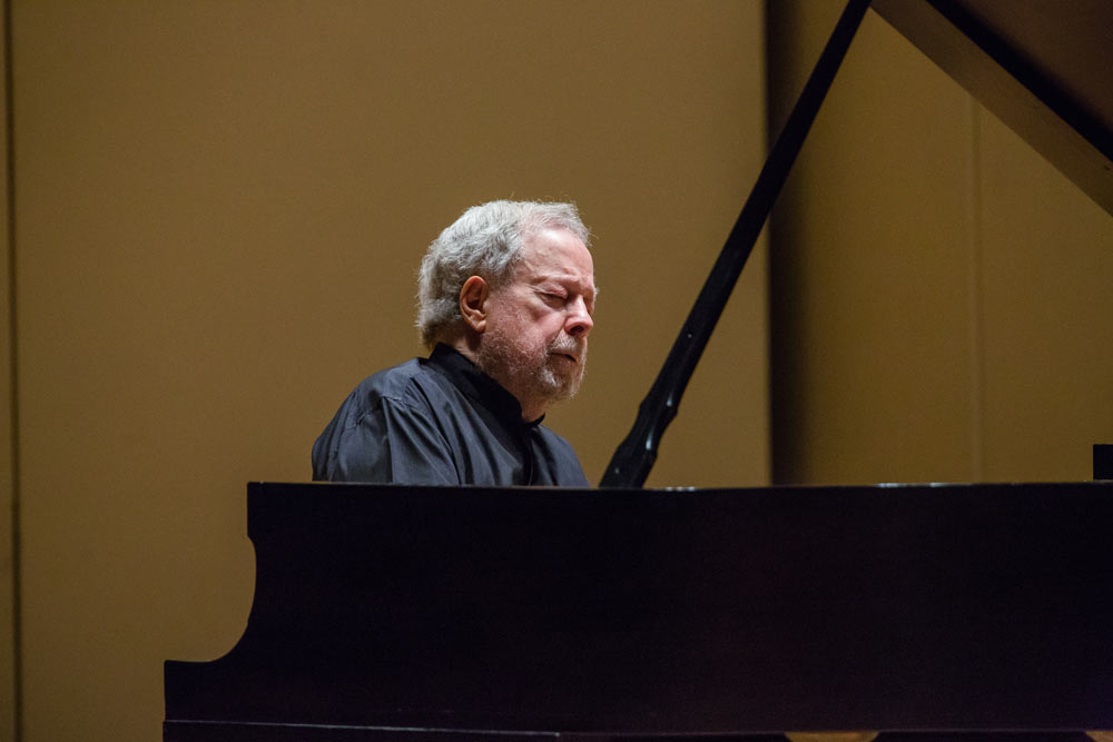 Nelson Freire playing the piano on stage