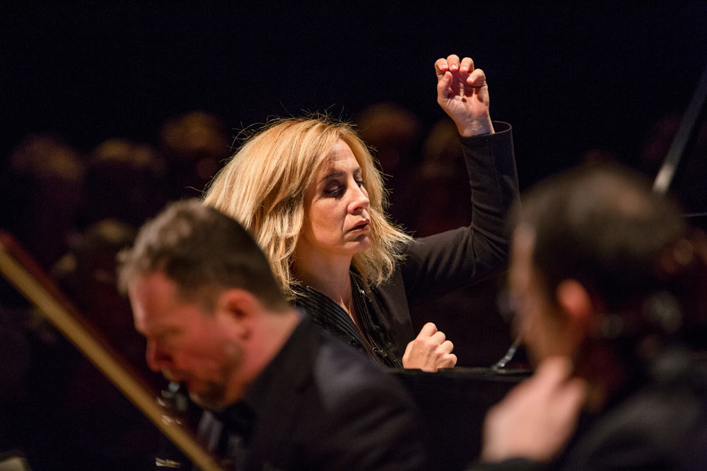 close up of Ingrid Fliter conducting