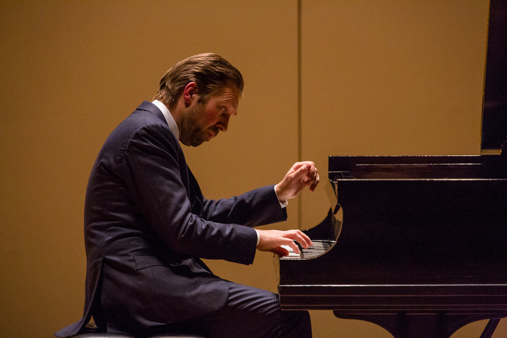 Leif Ove Andsnes on stage playing the piano