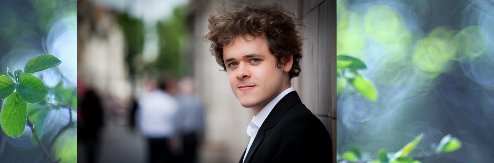benjamin grosvenor portrait, green leaves in background
