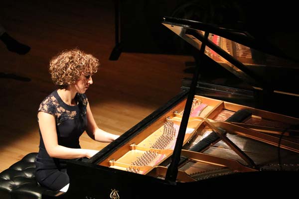 Sara Daneshpour playing piano at Rising Star Series0