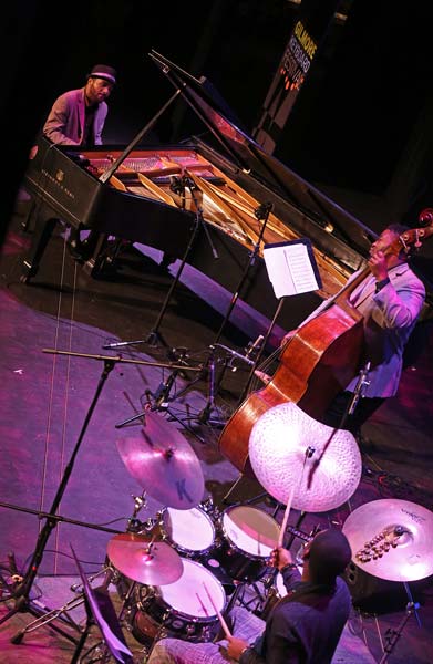 an aerial shot of the Sullivan Fortner Trio on stage