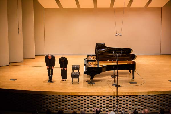 Kirill Gerstein and Katherine Chi bowing at the Dalton Center.