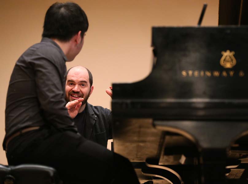 Kirill Gerstein and a student looking at each other