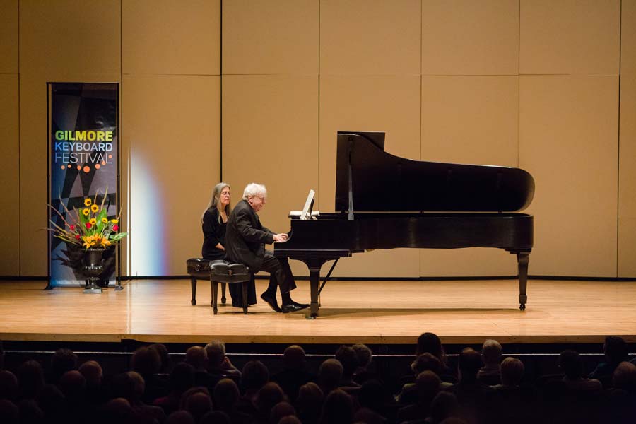 Richard Goode sitting at the piano during his performance