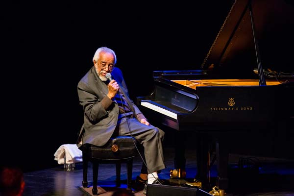 a member Barry Harris Trio speaking to the audience