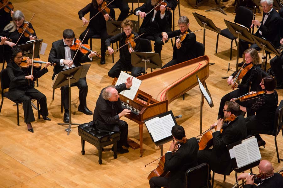Jeffrey Kahane at piano conducting orchestra