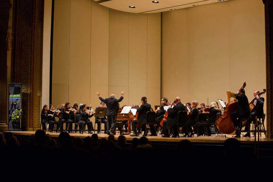 Jeffrey Kahane conducting orchestra