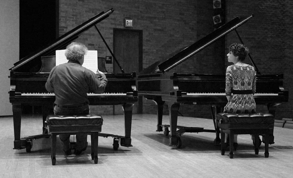 Jeffrey Kahane with a student at his master class