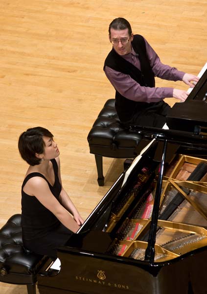 Llyr Williams playing with a student