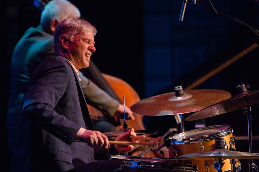 the Mr. B Trio's drummer during the performance