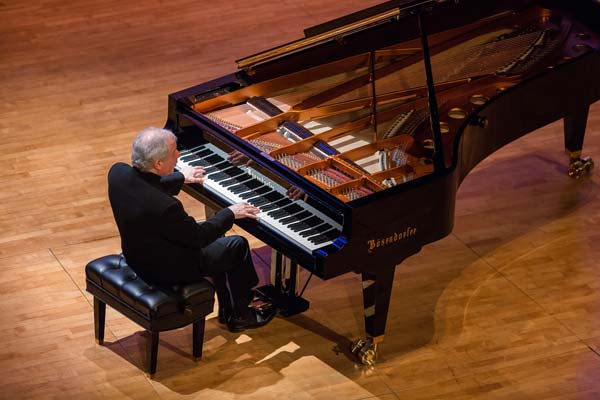 Sir András Schiff playing piano
