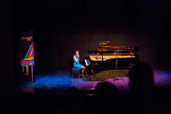 Stephanie Trick on stage at the piano