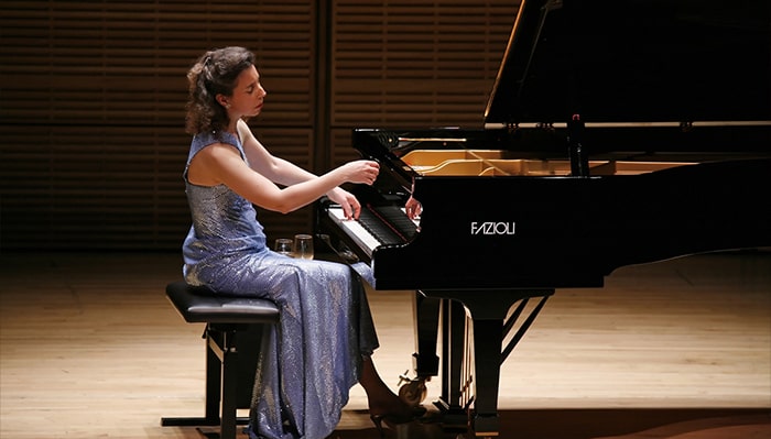 angela hewitt performs piano on stage