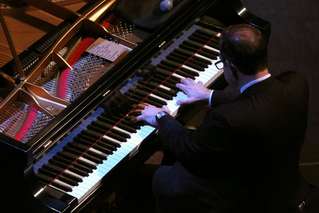 aerial shot of Bill Charlap Trio pianist performing