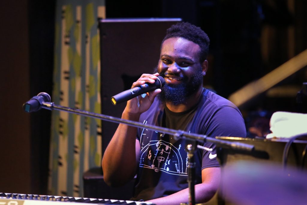 James Francies Trio pianist on microphone