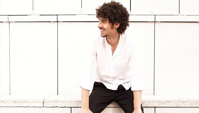 portrait of federico colli in front of white wall