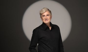 Jean-Yves Thibaudet poses for a portrait with a spotlight