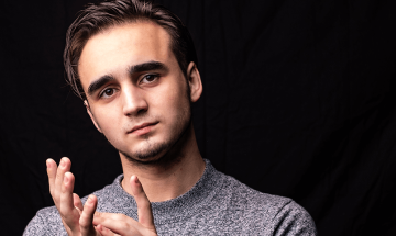 Illia Ovcharenko on a black background