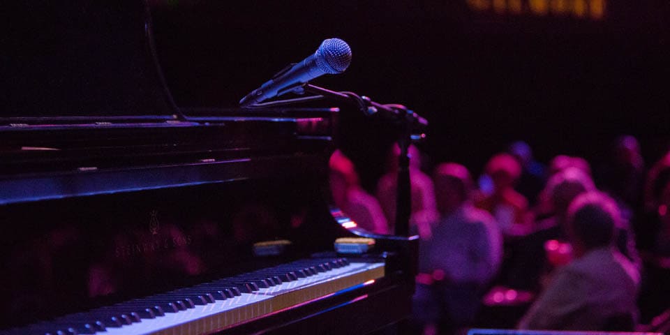 a piano and a microphone