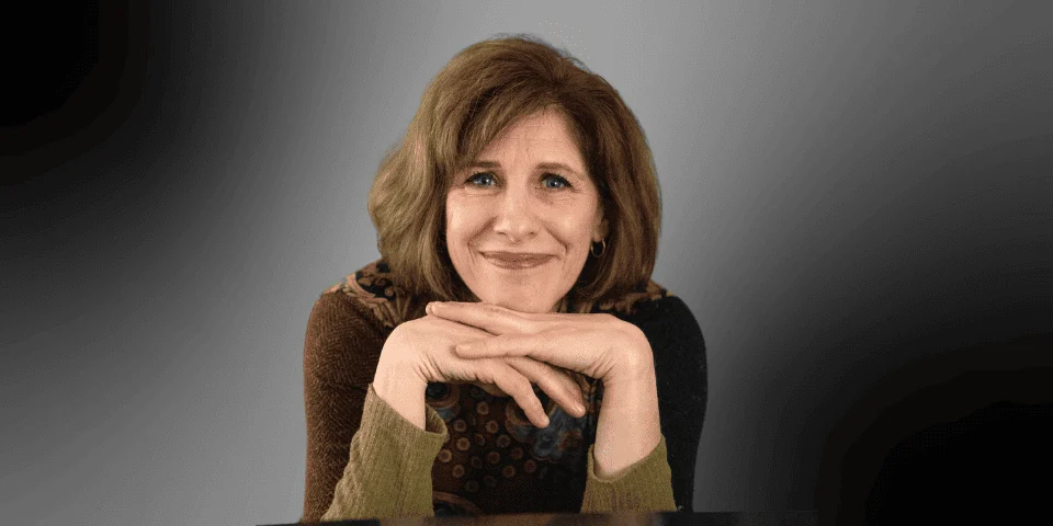 A headshot of Lori Sims