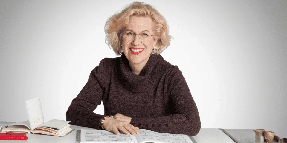A portrait of Sara Davis Buechner