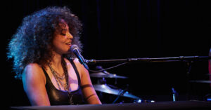 Kandace Springs playing the keyboard